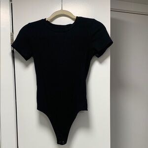 Black ribbed crew neck body suit